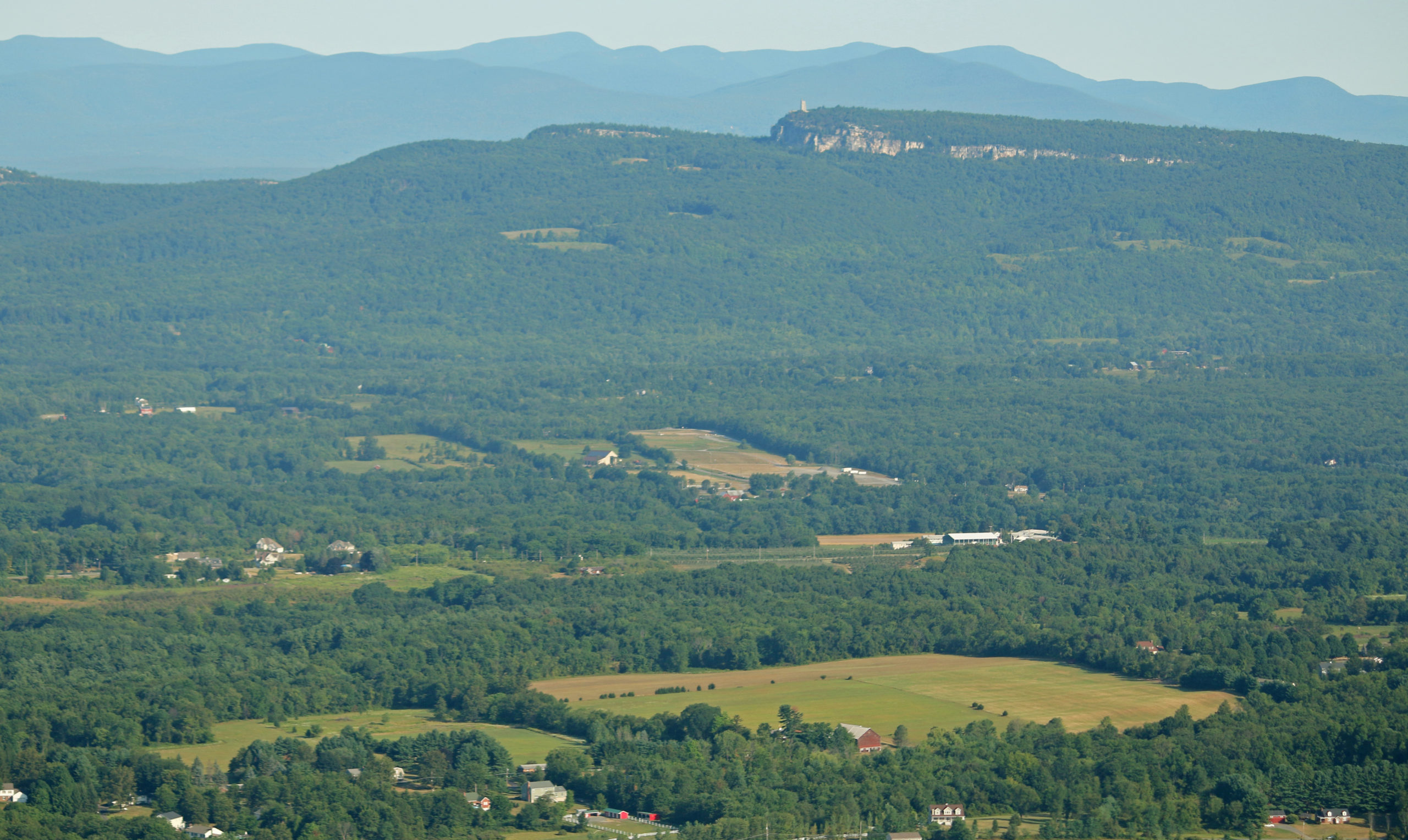 Aerial view looking at the foothills valley toward ridge