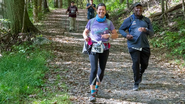 Runners on a trail at Mohonk Preserve.