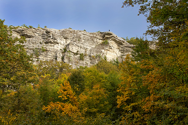 Hikers on top of Bonticou Crag in Autumn