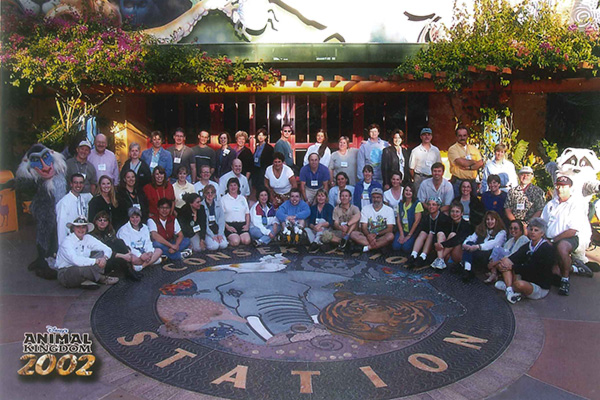 A group of educators in Disney World attend an award ceremony